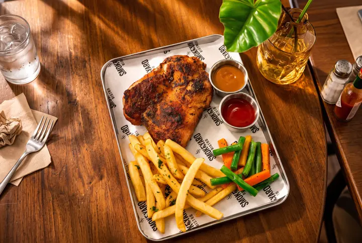 Chicken steak with sauce and veggies